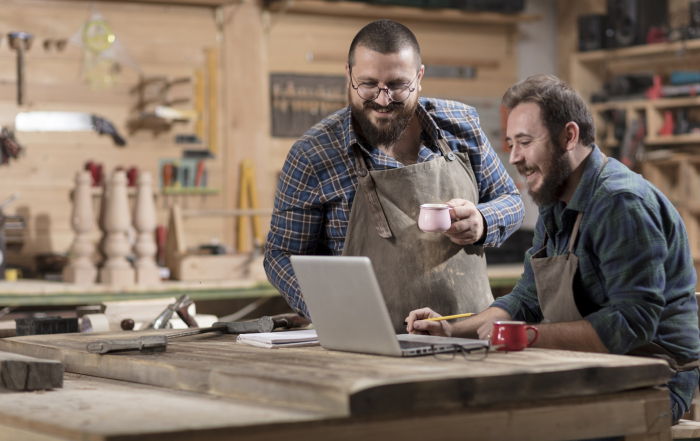 Small Business Owners Reviewing Their Finances